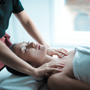 Woman receiving shoulder massage, spa, relaxation, shoulder pain