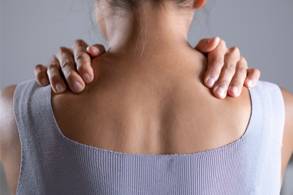 Asian woman has shoulder pain. Female holding painful shoulder with another hands. People with body-muscles problem, Healthcare And Medicine