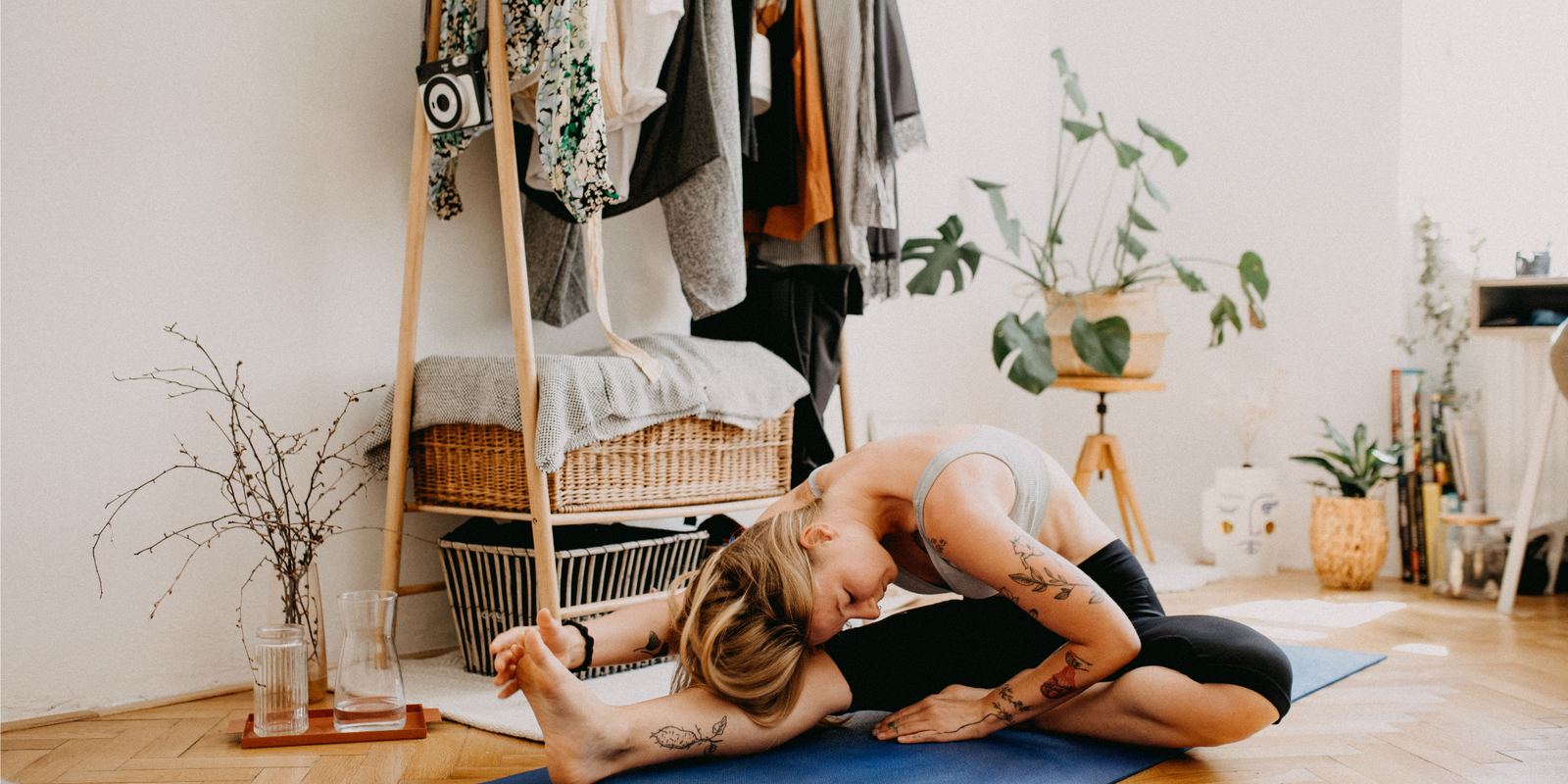 woman streching, doing yoga in yoga mat