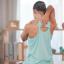 Physical therapy, chiropractor and back pain of a woman patient ready for physiotherapy and wellnes.