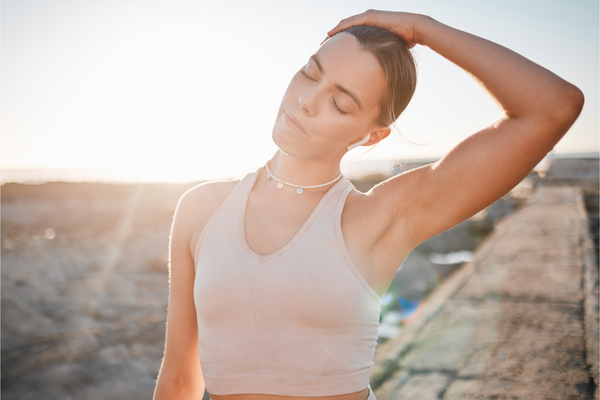 Beach, fitness or woman stretching neck for exercise running, marathon training 