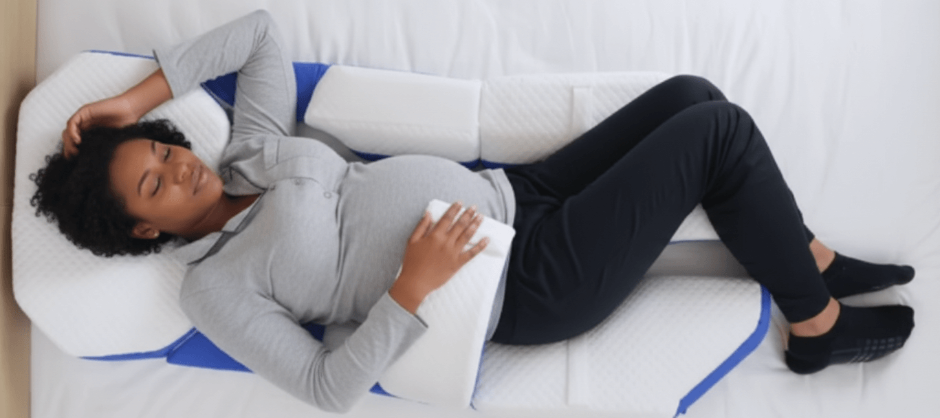 Pregnant woman supported for hip and pelvic comfort